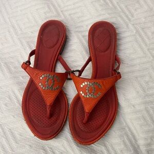 CHANEL Red Leather Sandals with Silver Accents